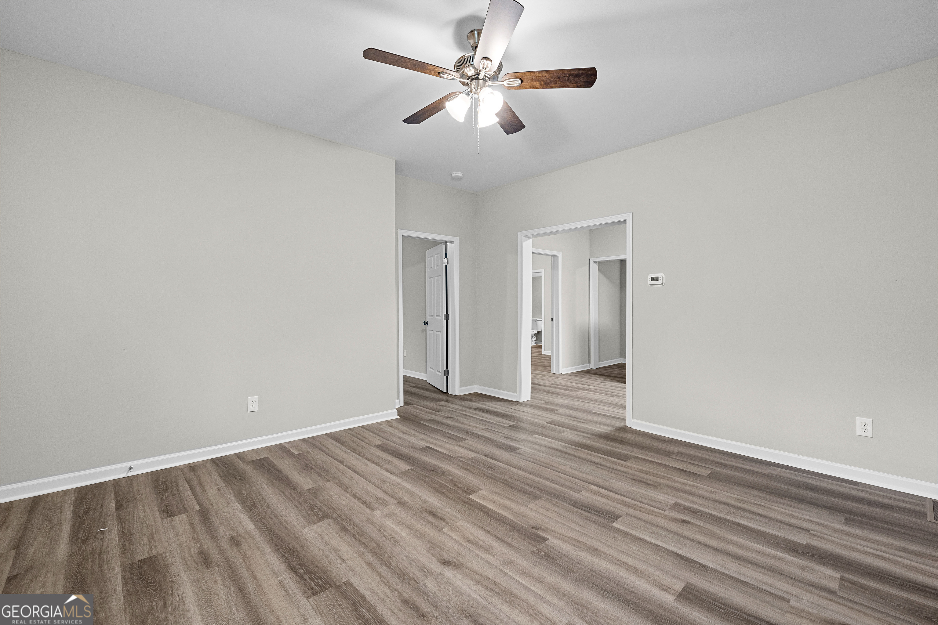 21 Shepard Street Grantville, GA 30220 - Photo 7 of 29 a view of an empty room with wooden floor