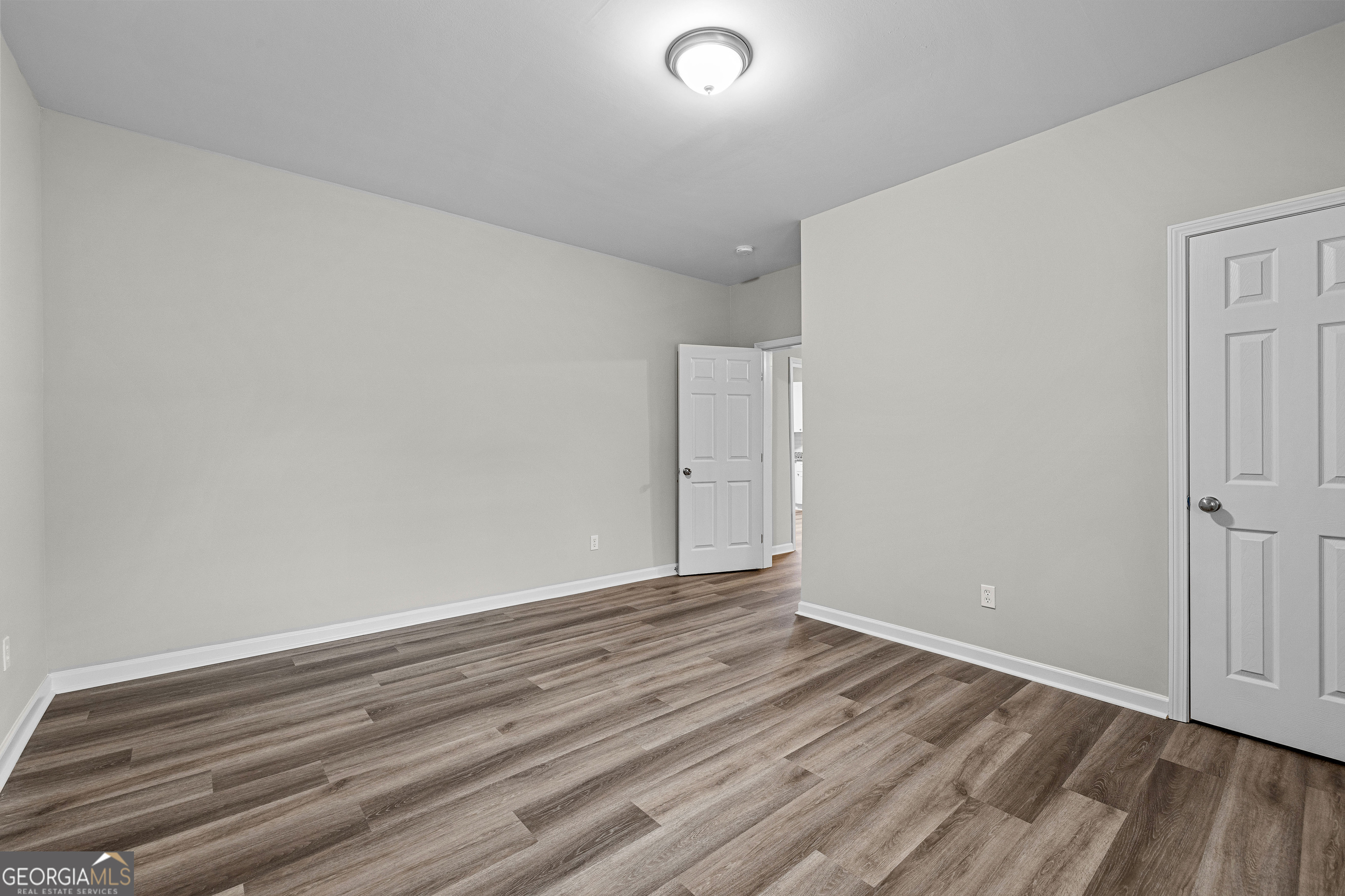 21 Shepard Street Grantville, GA 30220 - Photo 10 of 29 a view of room with wooden floor