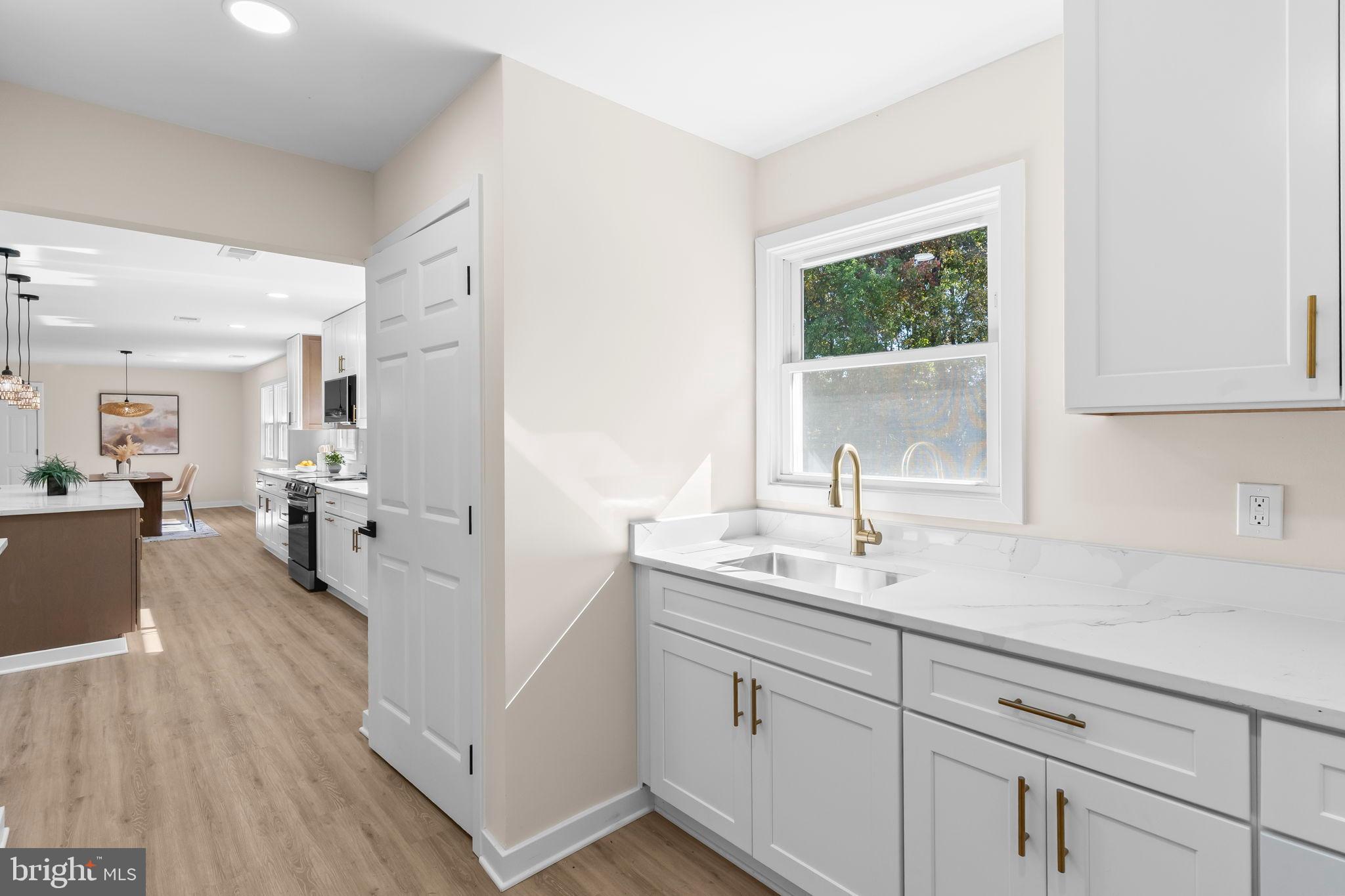 719 Manning Road East Accokeek, MD 20607 - Photo 23 of 36 Bright and airy kitchen with modern finishes.