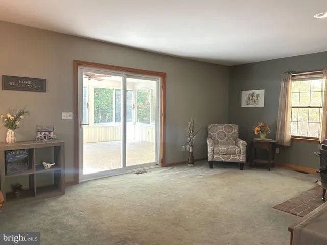 a room with furniture and window
