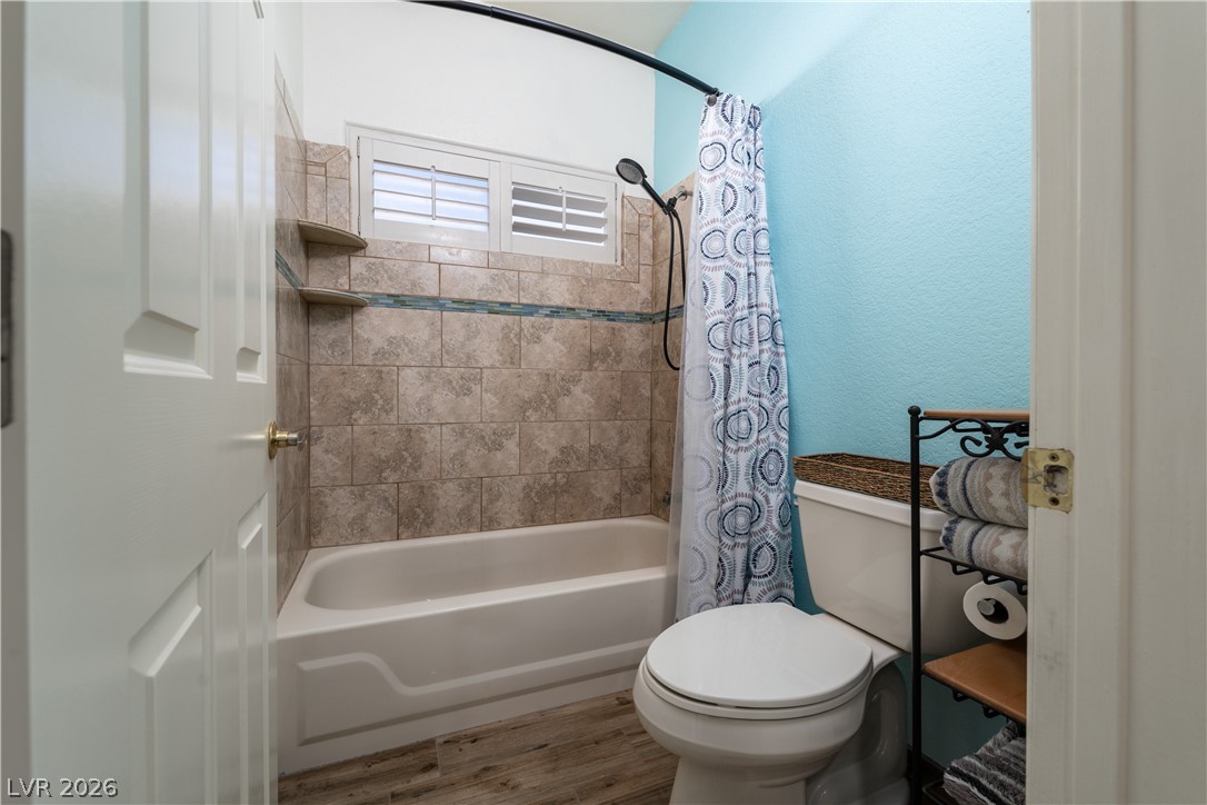 2108 Inverness Drive Henderson, NV 89074 - Photo 30 of 46 Full bath with shower / tub combo and wood finished floors