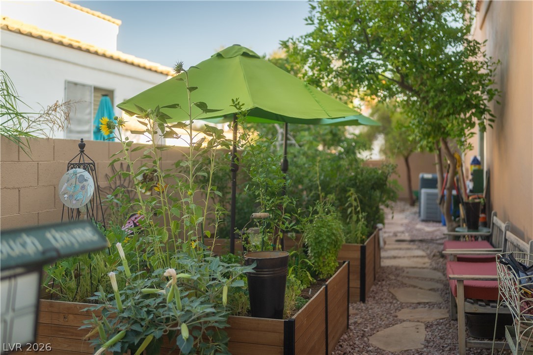 2108 Inverness Drive Henderson, NV 89074 - Photo 36 of 46 View of yard featuring a vegetable garden
