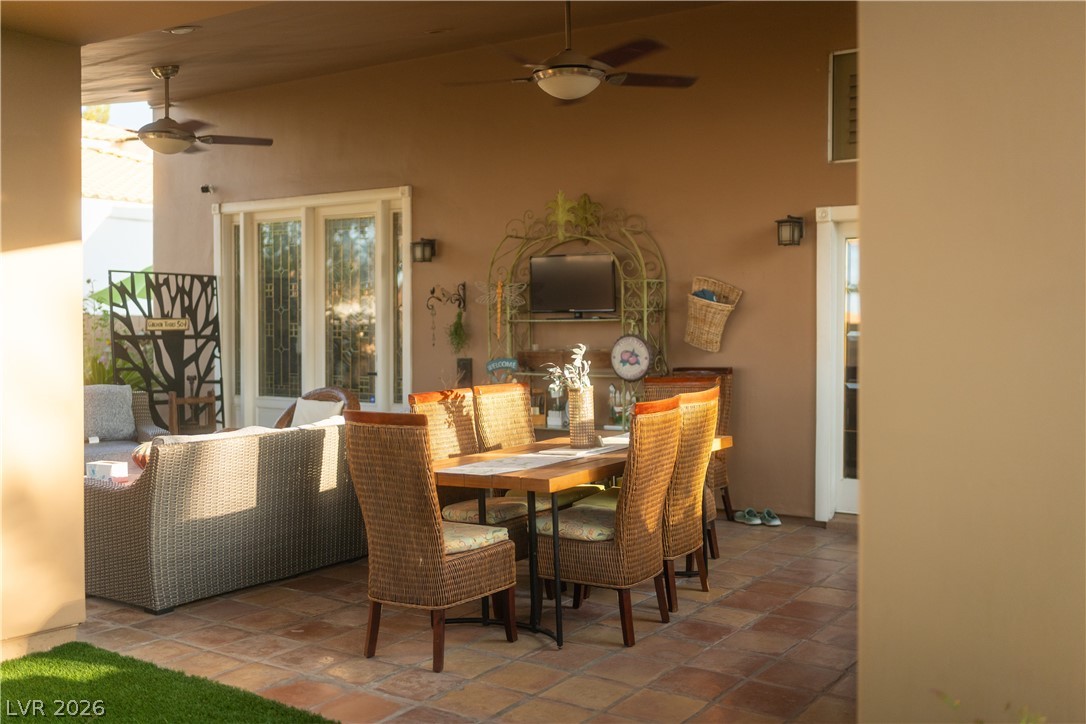 2108 Inverness Drive Henderson, NV 89074 - Photo 37 of 46 Dining room with ceiling fan and high vaulted ceiling