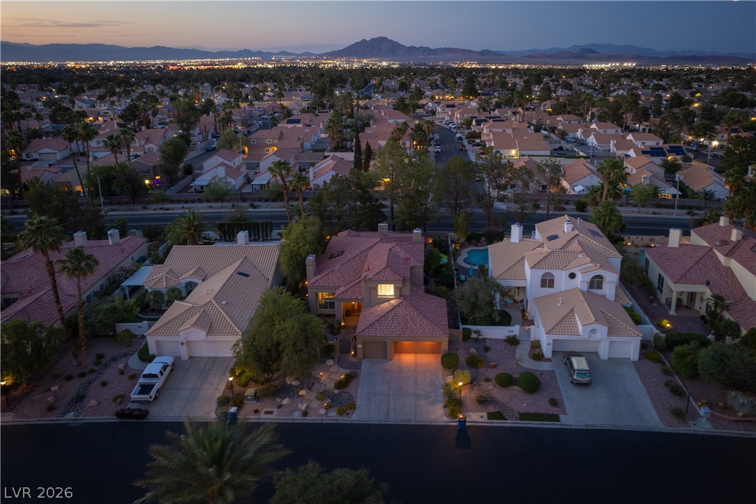 2108 Inverness Drive Henderson, NV 89074 - Photo 43 of 46 Aerial view at dusk of a residential view and a mountain view