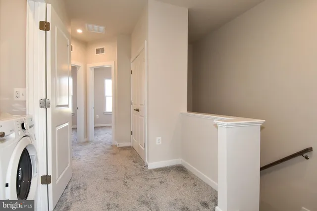 a view of a room with racks on the wall