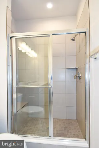 a view of entryway with white walls