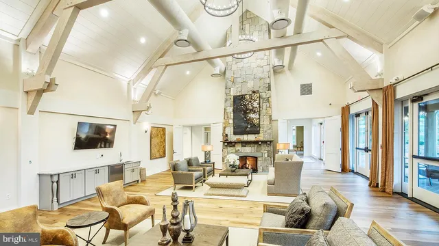 a view of a swimming pool with a yard