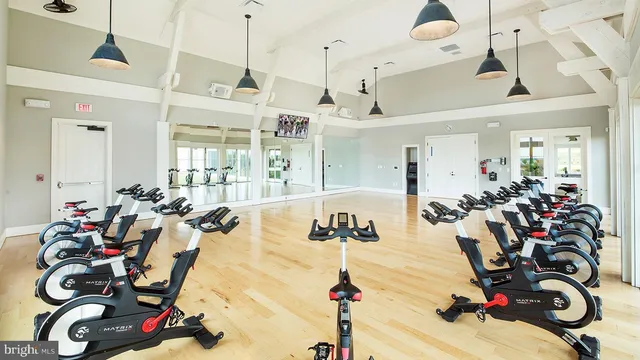 a sign broad in front of flowers