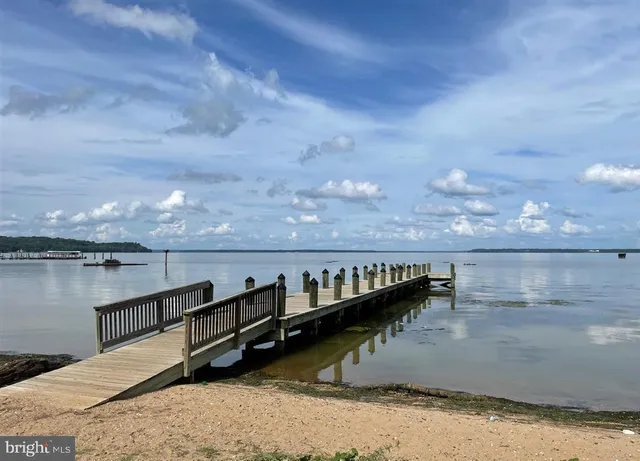 a sign that is sitting in the middle of a field