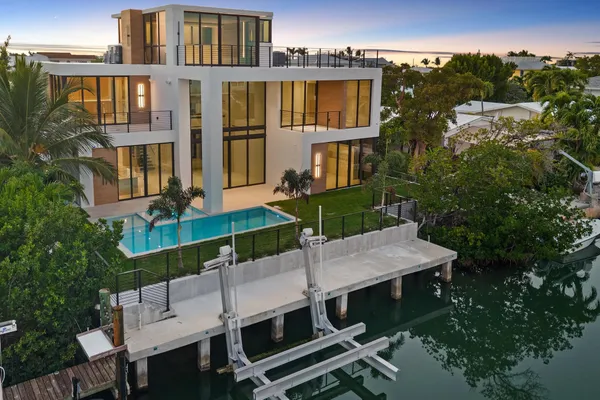 a view of a house with a street