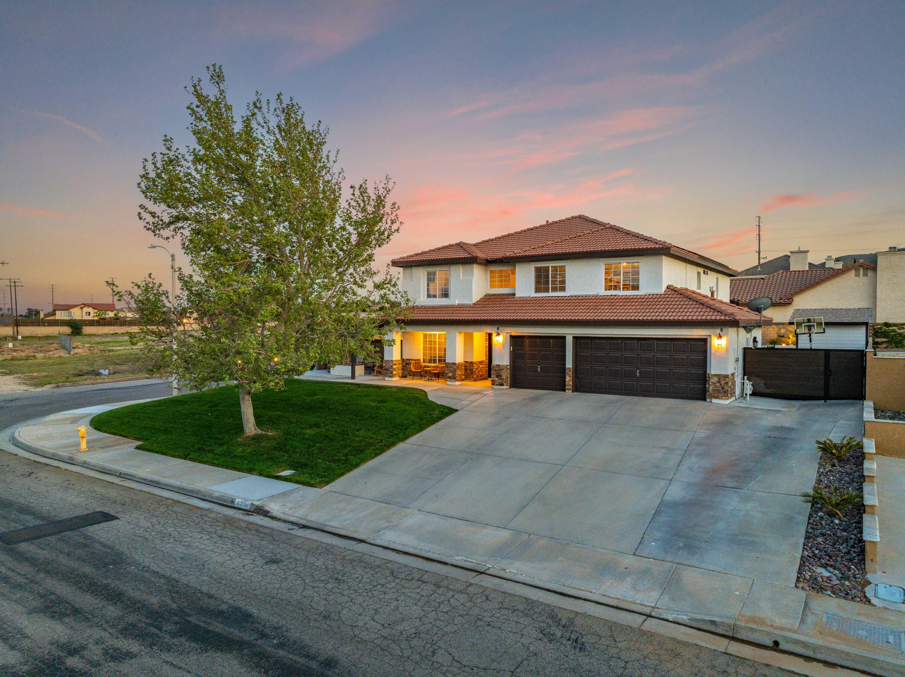 6204 Shadow Hill Drive Lancaster, CA 93536 - Photo 2 of 82 a front view of a house with a yard
