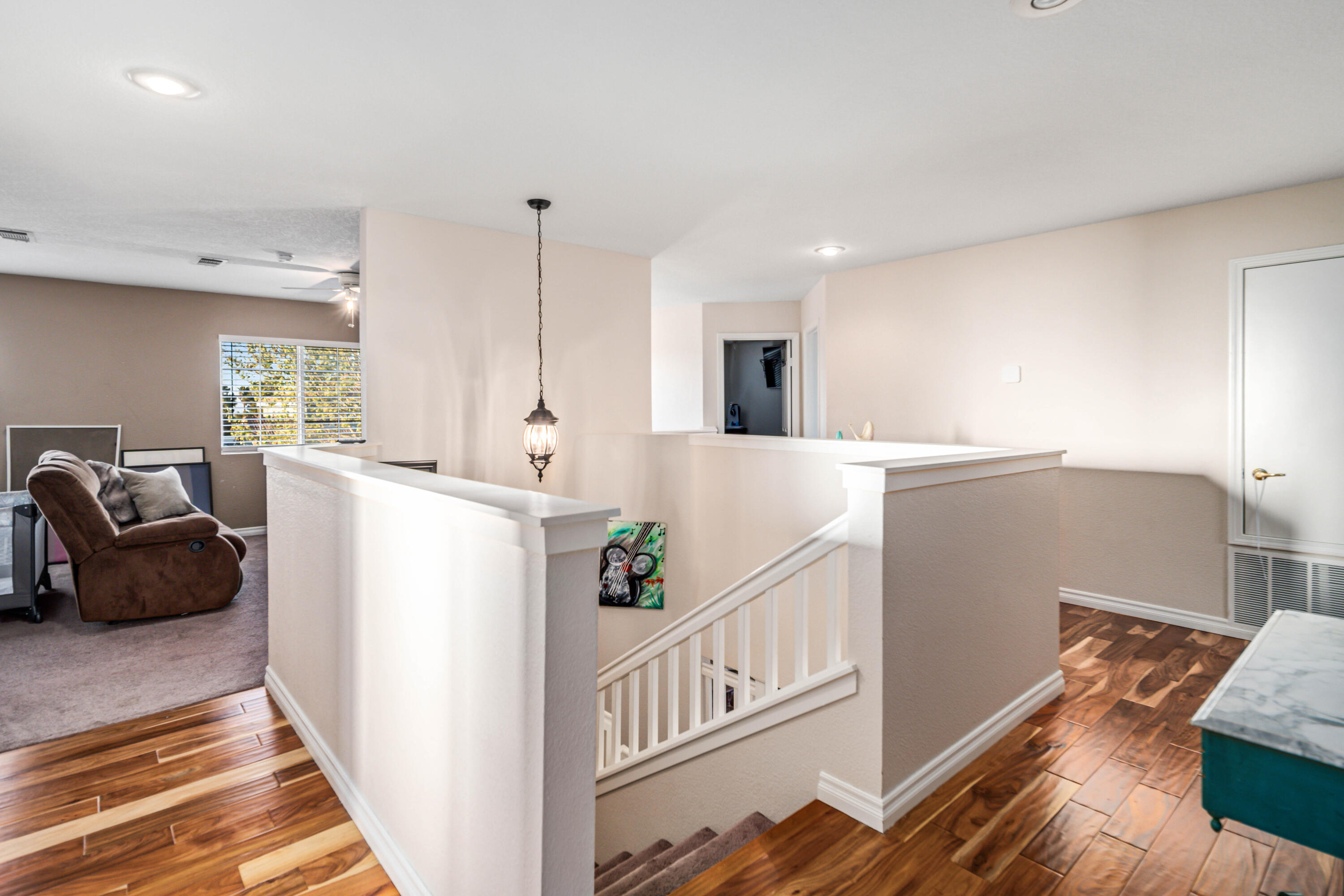 6204 Shadow Hill Drive Lancaster, CA 93536 - Photo 28 of 82 a living room with furniture and a wooden floor