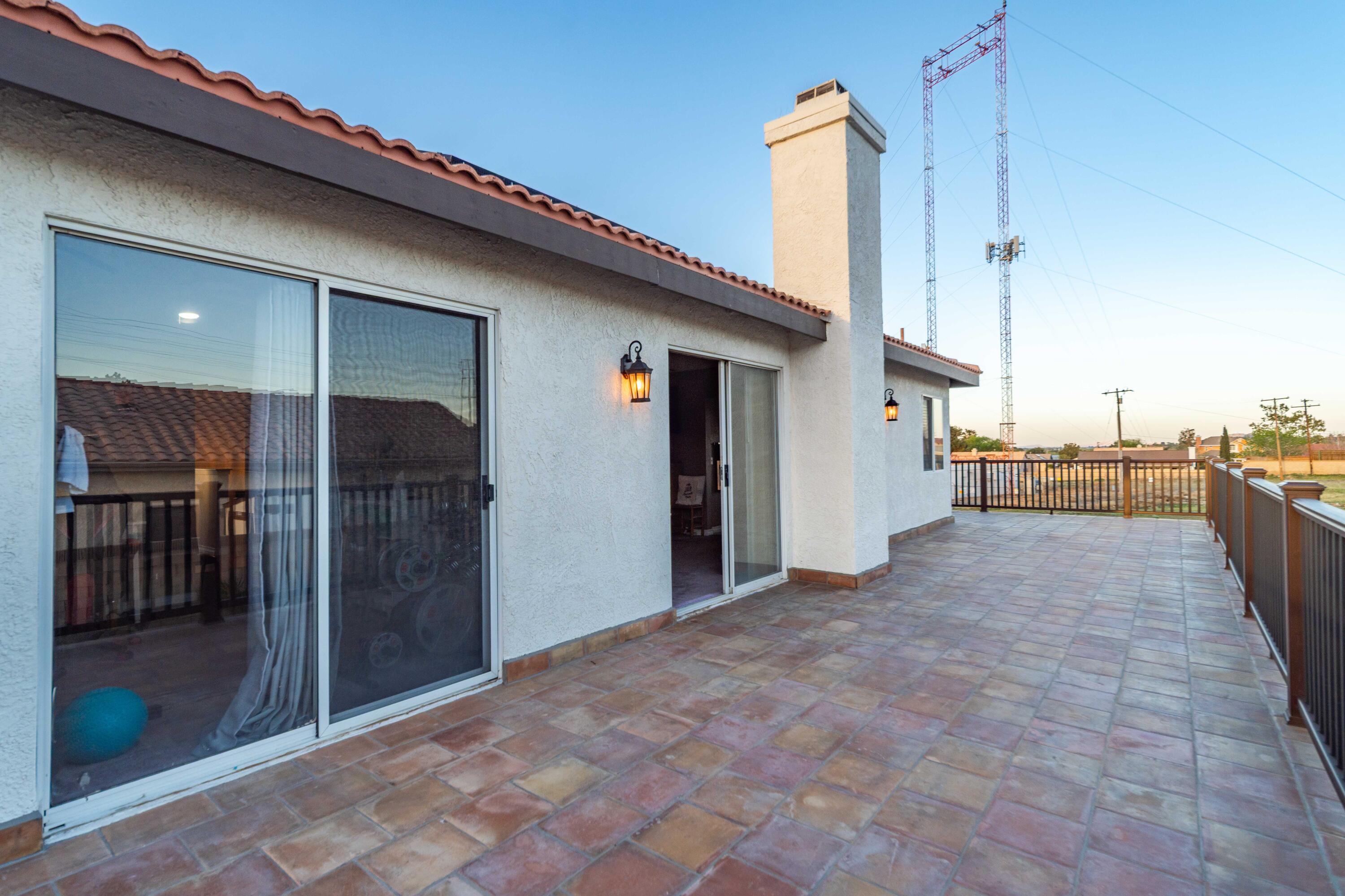 6204 Shadow Hill Drive Lancaster, CA 93536 - Photo 44 of 82 a view of a living room with a balcony