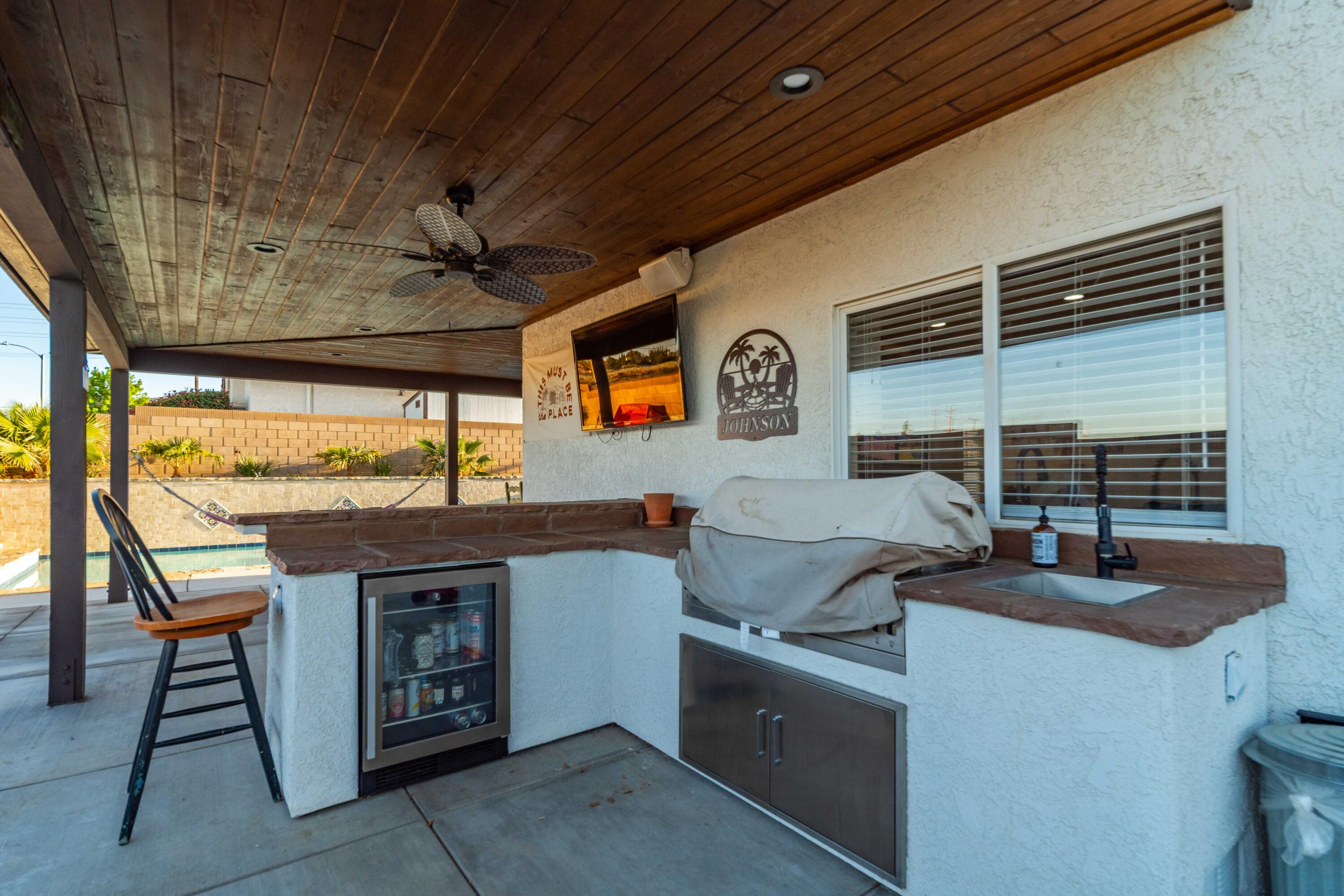6204 Shadow Hill Drive Lancaster, CA 93536 - Photo 51 of 82 a kitchen with a stove and a sink