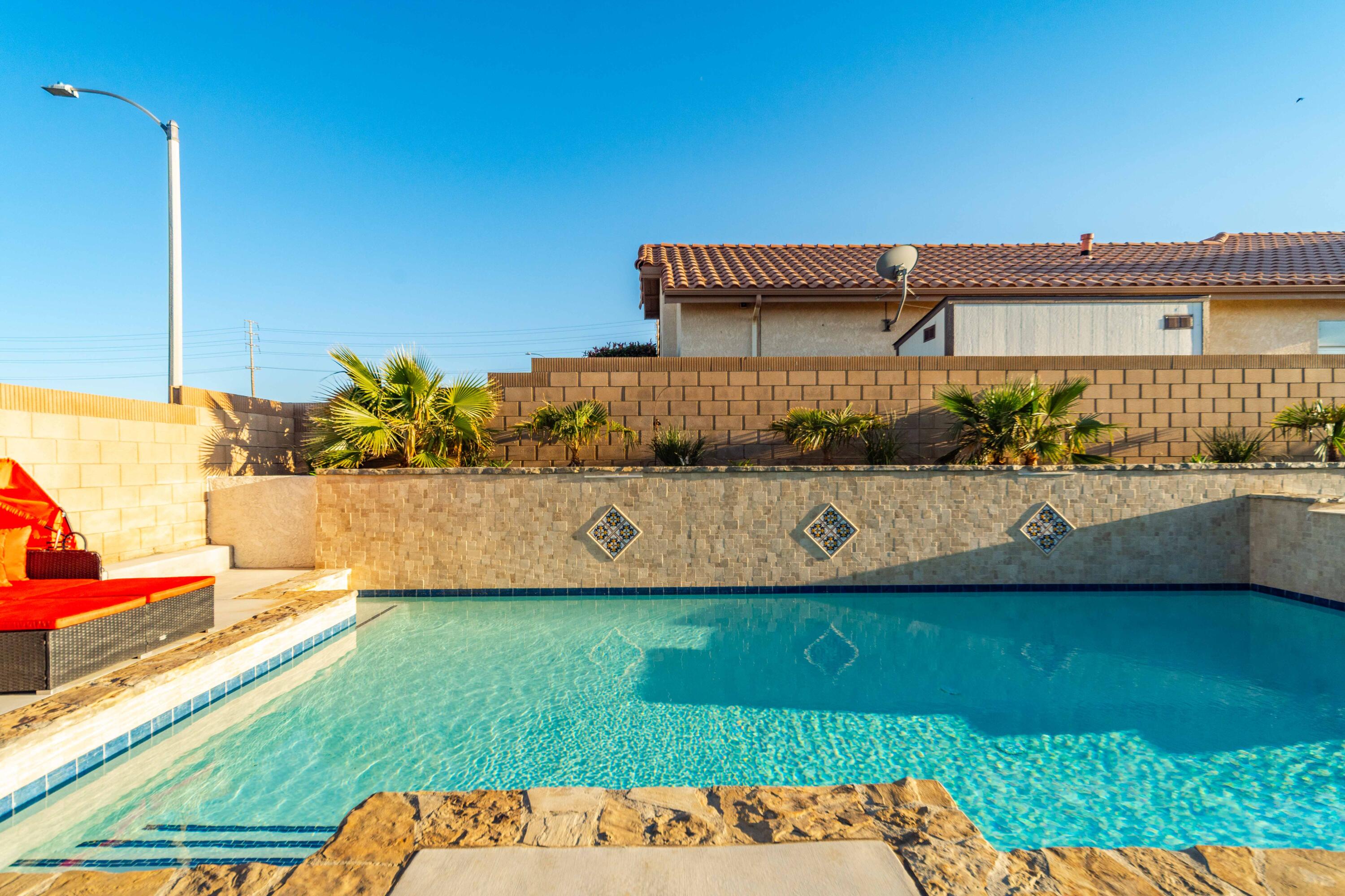 6204 Shadow Hill Drive Lancaster, CA 93536 - Photo 56 of 82 a view of a swimming pool with a yard