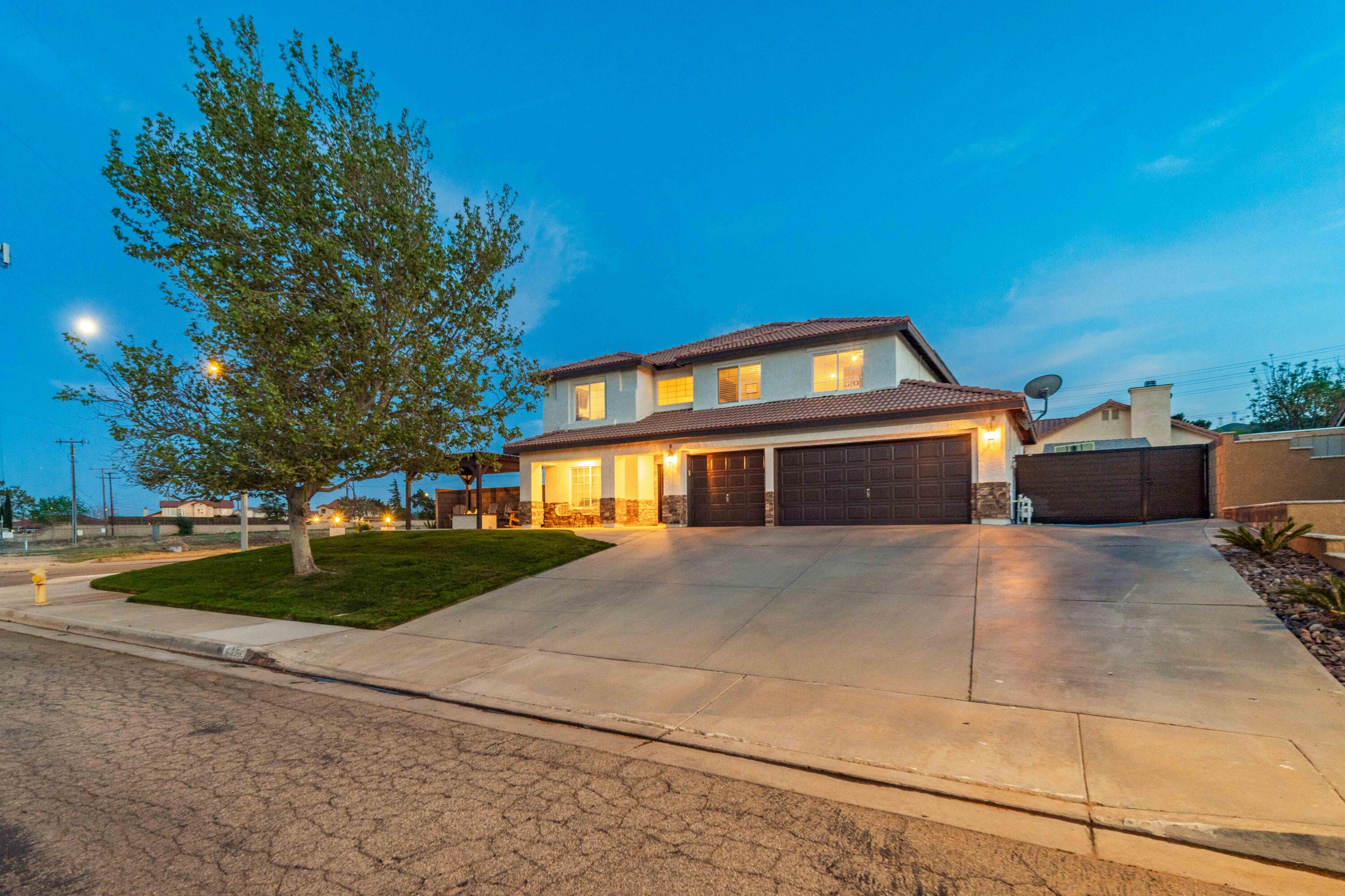 6204 Shadow Hill Drive Lancaster, CA 93536 - Photo 6 of 82 a front view of a house with a yard
