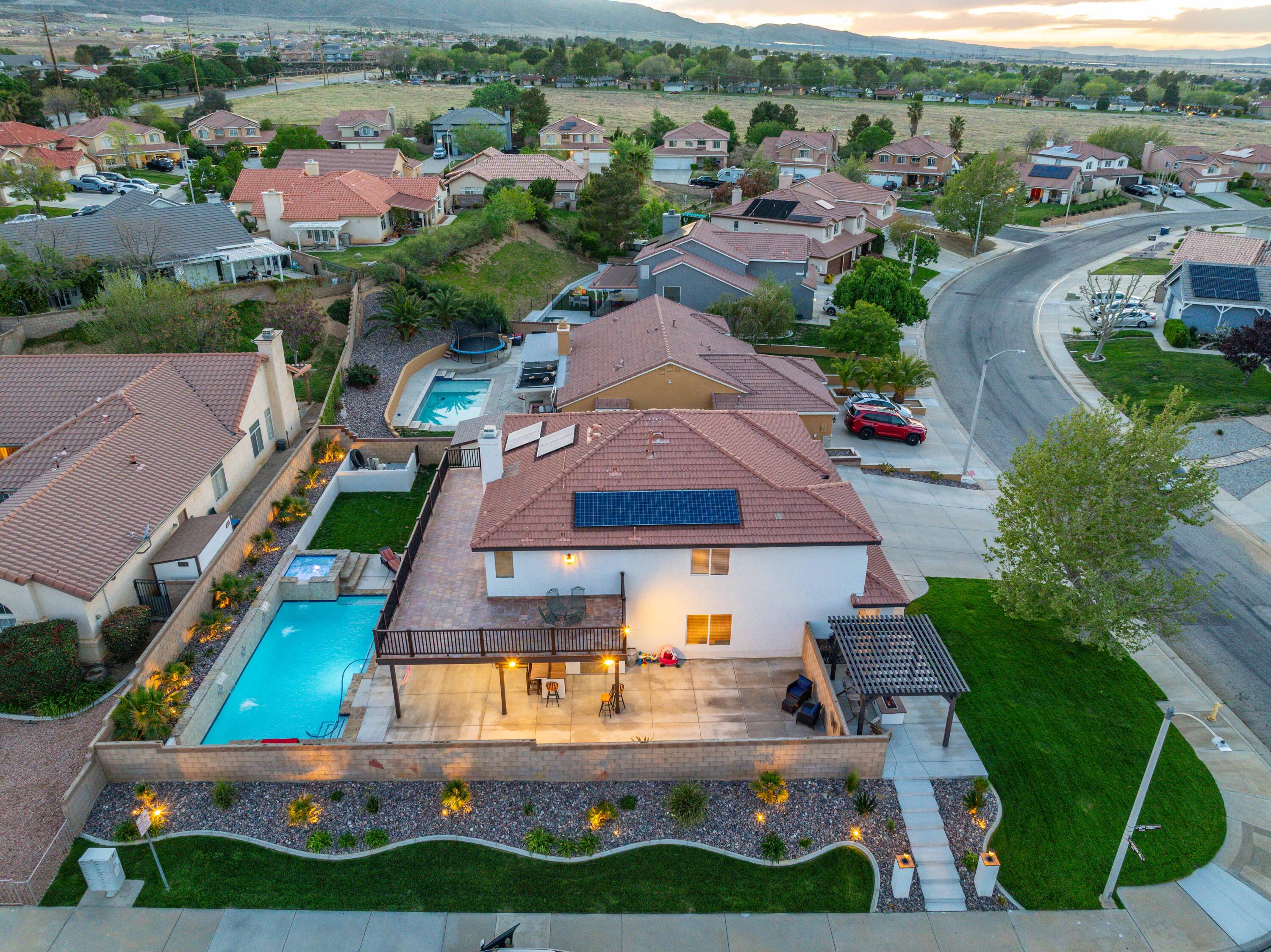 6204 Shadow Hill Drive Lancaster, CA 93536 - Photo 73 of 82 an aerial view of residential houses with yard and mountain view in back