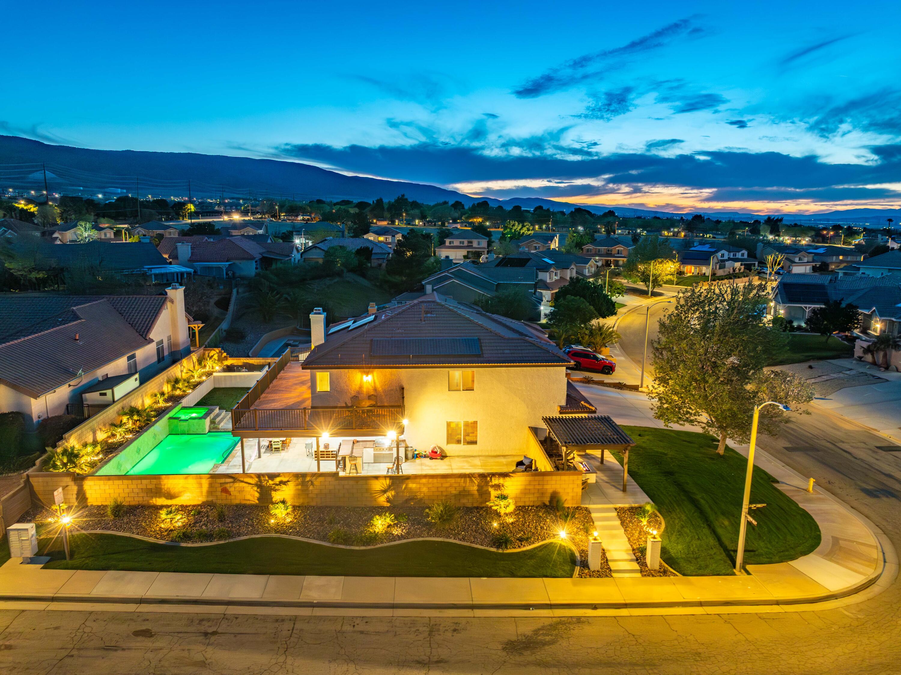 6204 Shadow Hill Drive Lancaster, CA 93536 - Photo 77 of 82 a view of a swimming pool with an outdoor seating