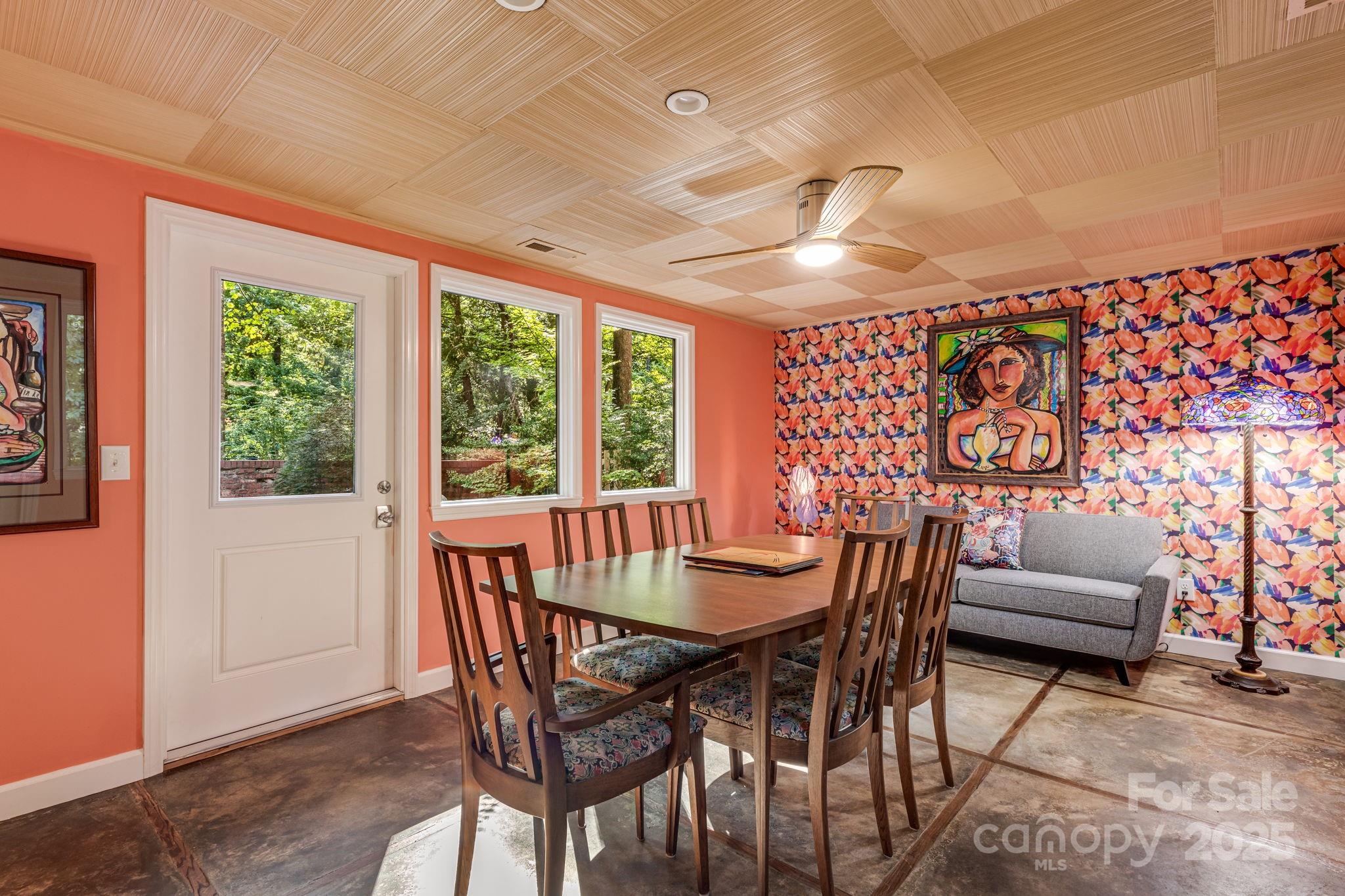 750 Braewick Road Tryon, NC 28782 - Photo 14 of 43 a view of a dining room with furniture window and outside view