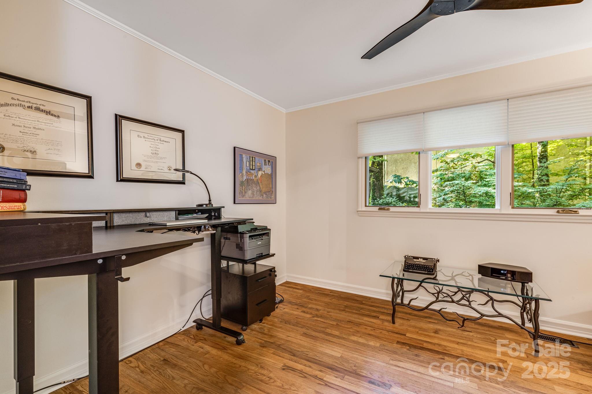 750 Braewick Road Tryon, NC 28782 - Photo 26 of 43 a view of a workspace with furniture and a window