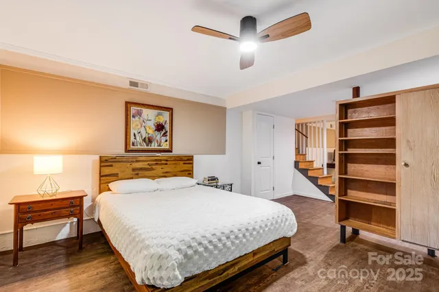 a bedroom with a bed and furniture