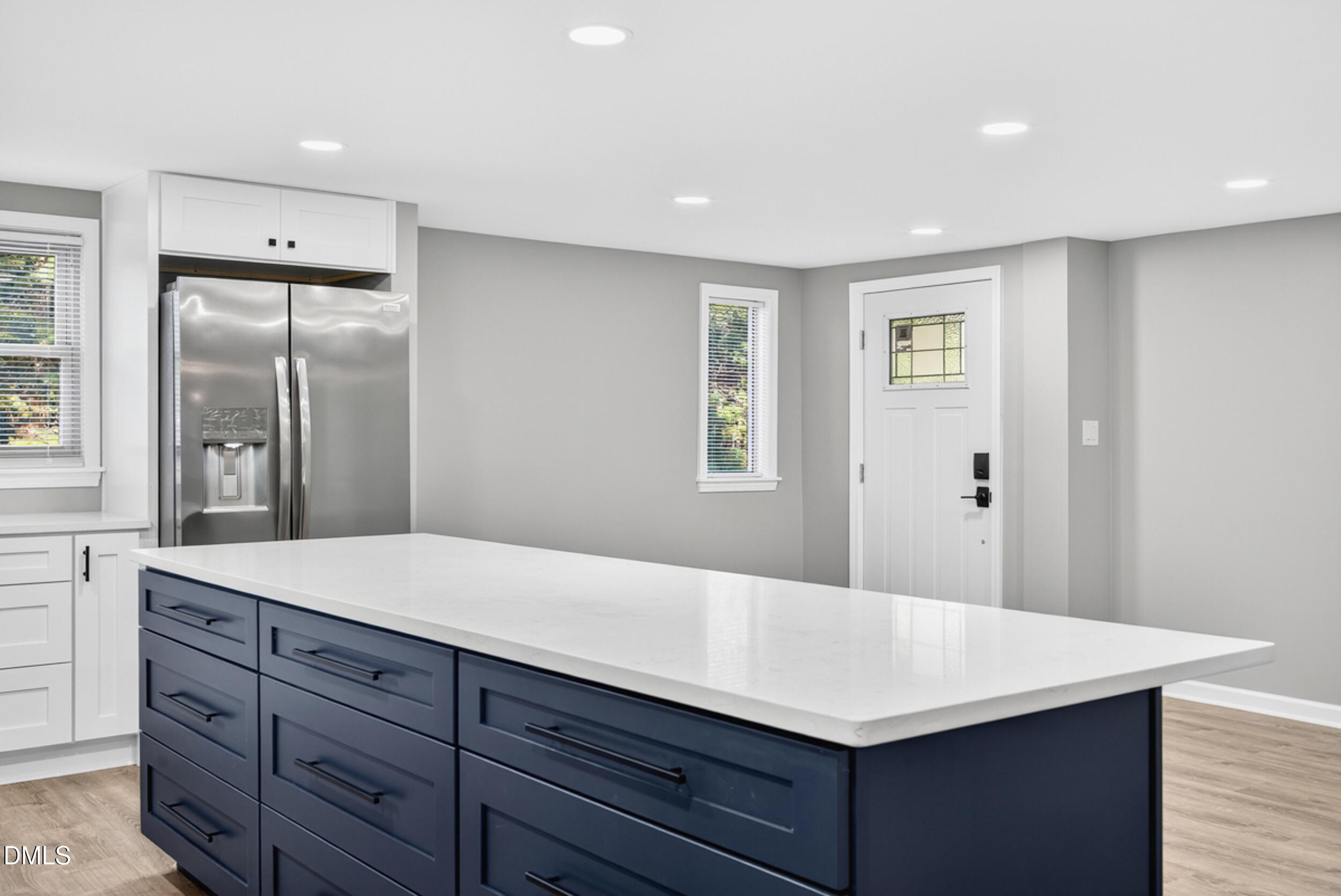 205 Bacon Road Rougemont, NC 27572 - Photo 11 of 29 a bathroom with a sink a vanity and a large mirror