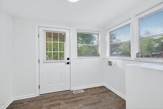 an empty room with windows