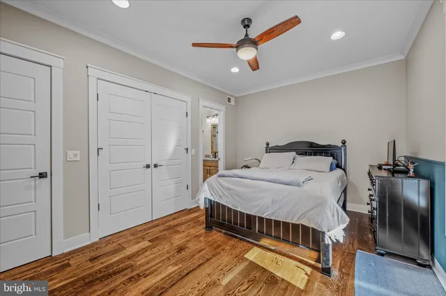 a living room with furniture kitchen view and a couch