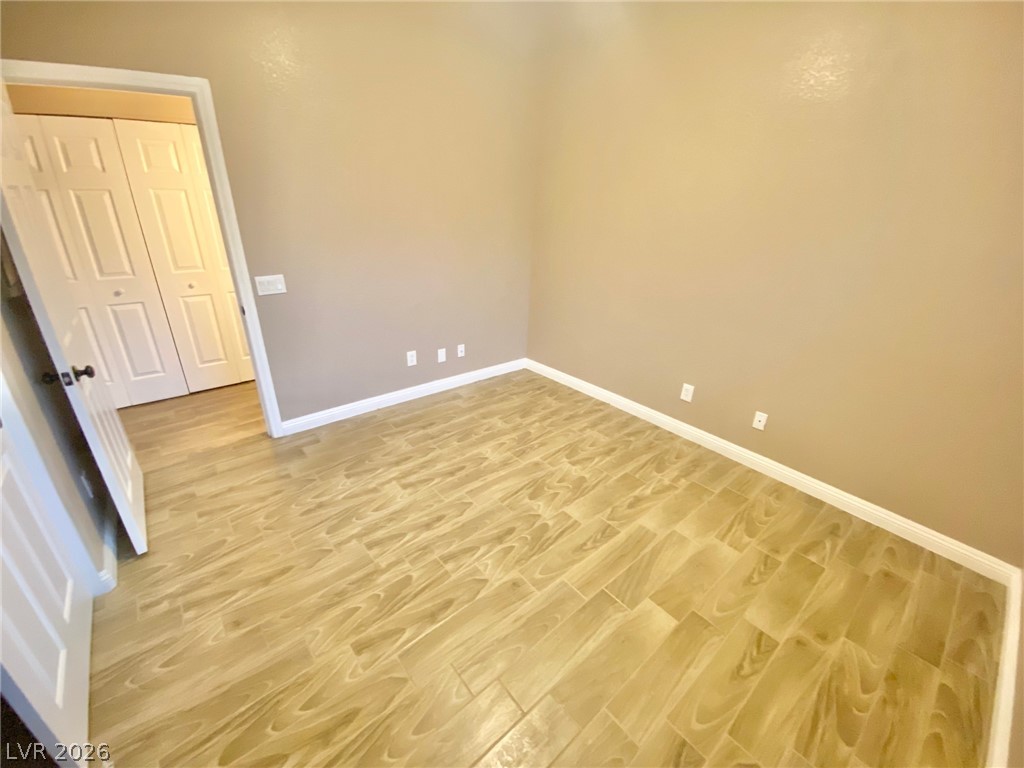2000 Turquoise Ridge Street, Unit 204 Las Vegas, NV 89117 - Photo 22 of 29 Hardwood-style tile flooring extends throughout this versatile, well-proportioned room.