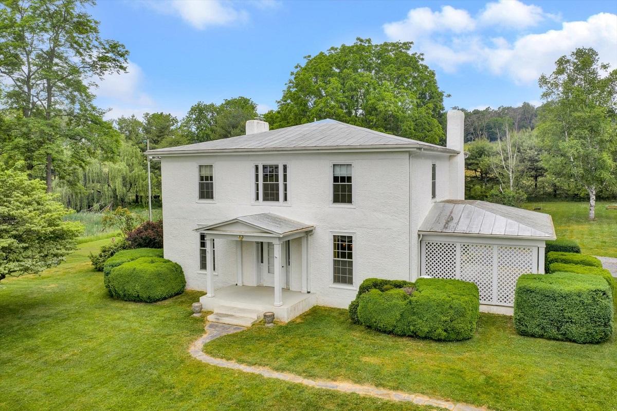 2501 Middlebrook Road Staunton, VA 24401 - Photo 1 of 50 a front view of a house with a garden