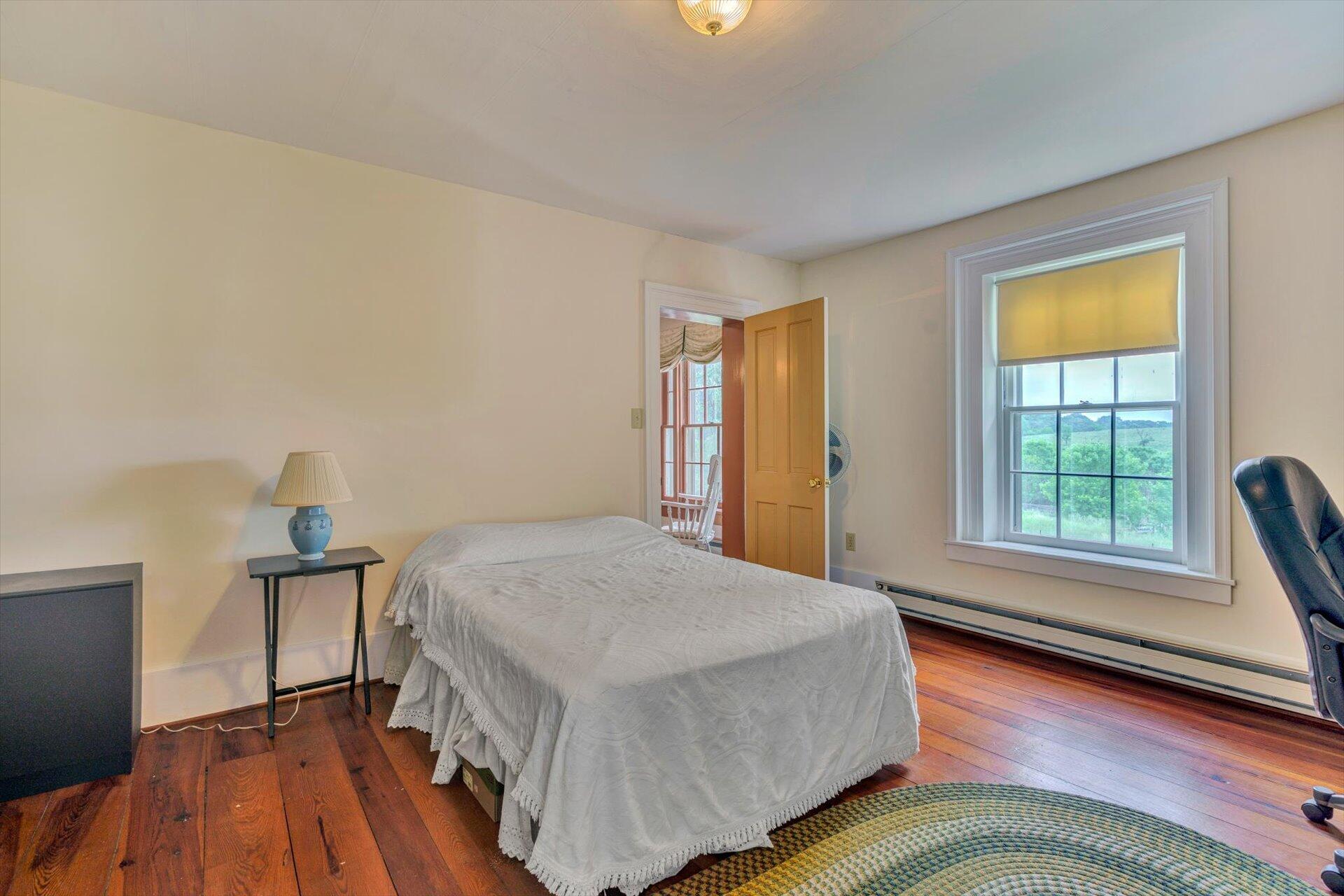 2501 Middlebrook Road Staunton, VA 24401 - Photo 22 of 50 a bedroom with a bed and a window