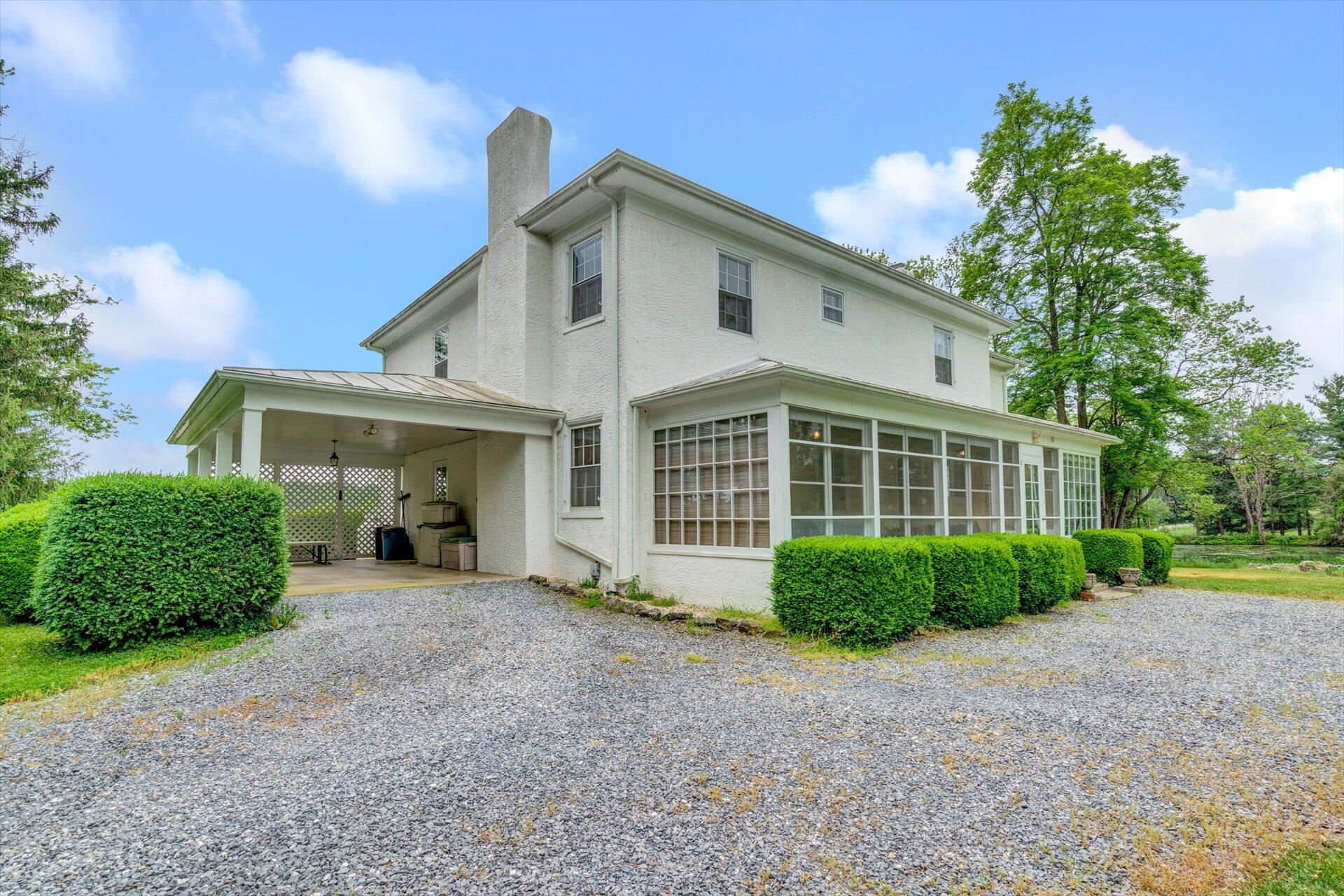 2501 Middlebrook Road Staunton, VA 24401 - Photo 33 of 50 a front view of a house with garden