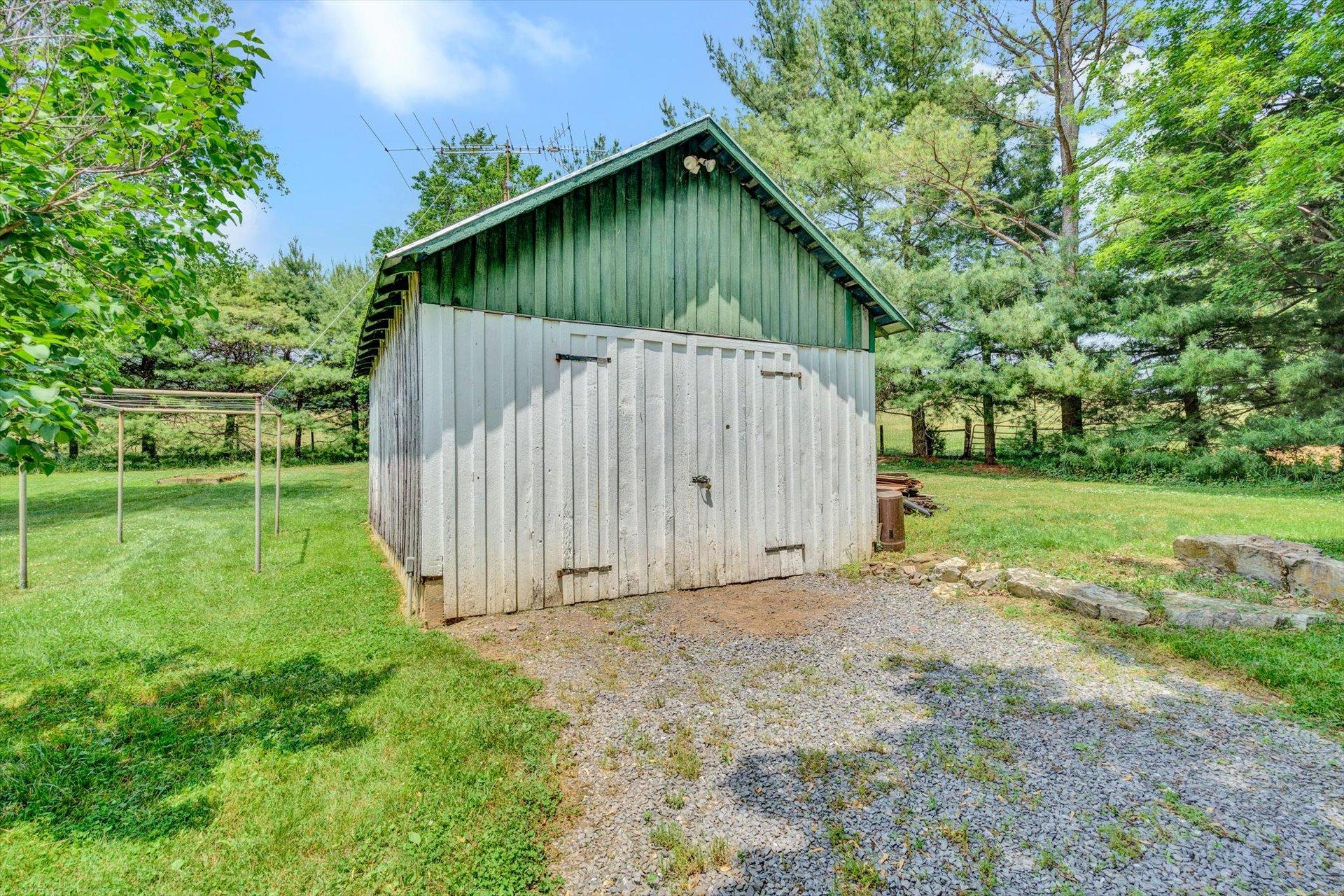 2501 Middlebrook Road Staunton, VA 24401 - Photo 34 of 50 a small barn with a oven in the forest