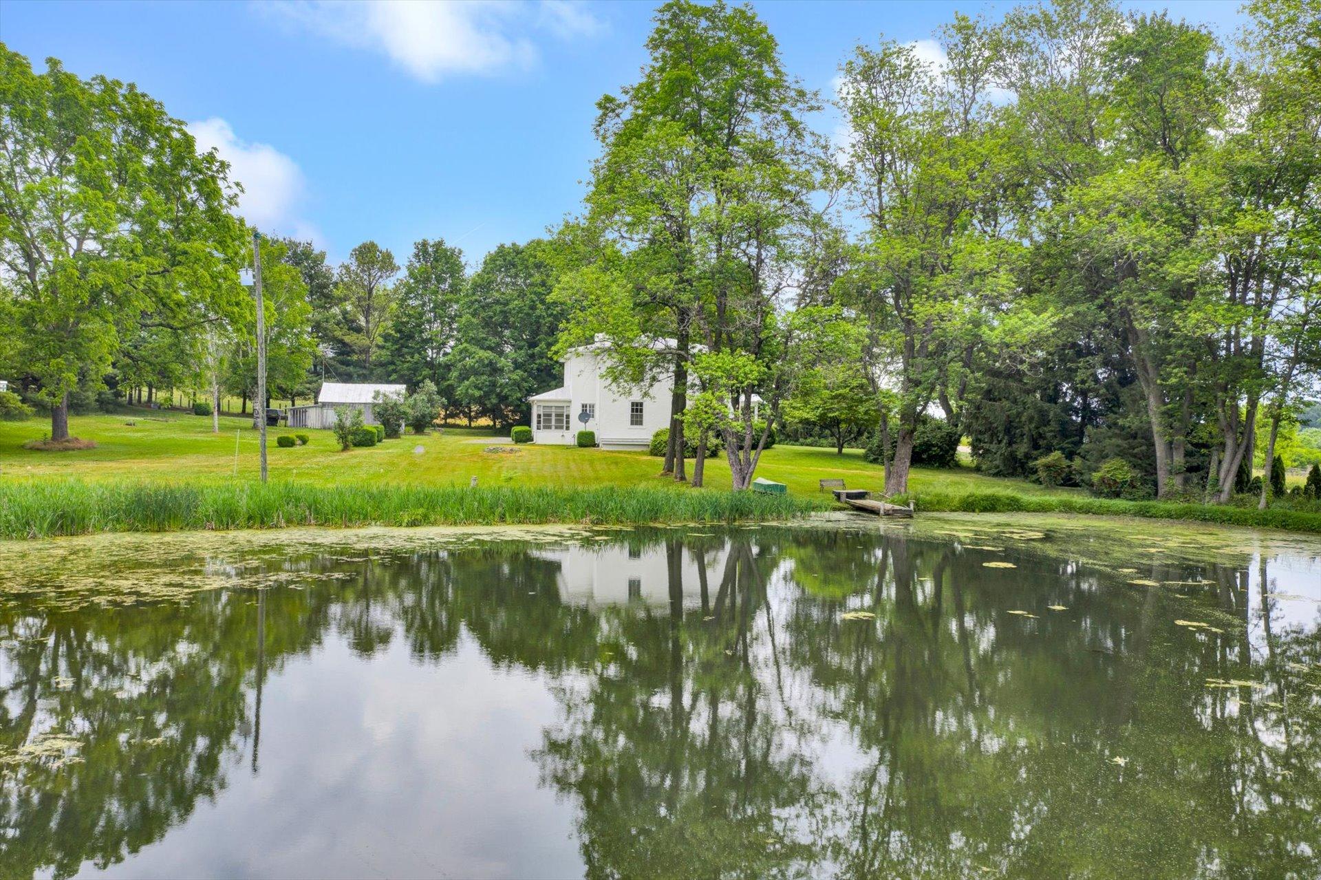 2501 Middlebrook Road Staunton, VA 24401 - Photo 41 of 50 a view of a lake with a house in the background