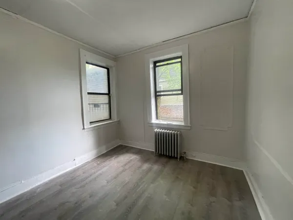 an empty room with windows