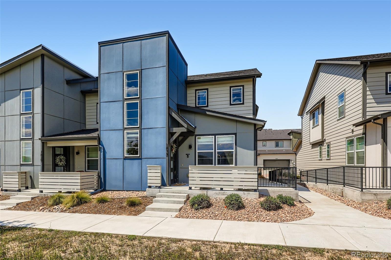 1835 Rose Quartz Heights Colorado Springs, CO 80908 - Photo 2 of 31 a front view of a house with garden