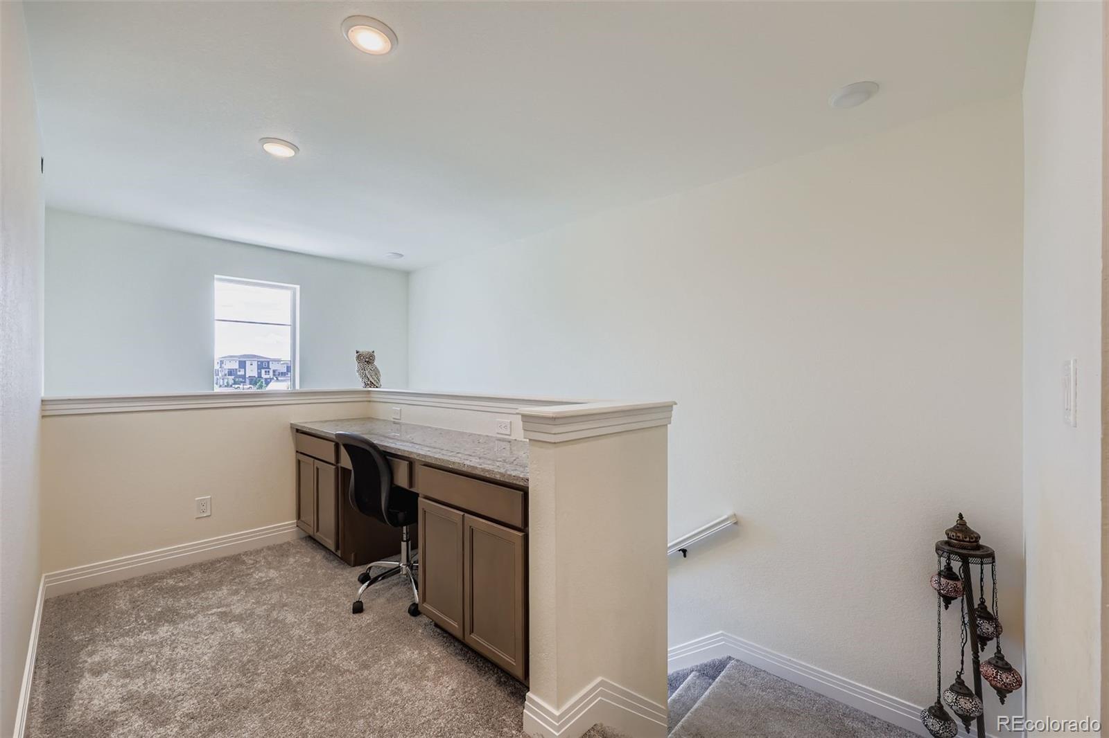 1835 Rose Quartz Heights Colorado Springs, CO 80908 - Photo 23 of 31 a view of storage and utility room with washer and dryer