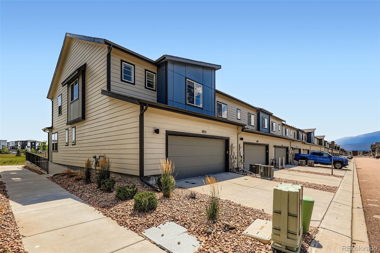 1835 Rose Quartz Heights Colorado Springs, CO 80908 - Photo 28 of 31 a front view of a house with garden
