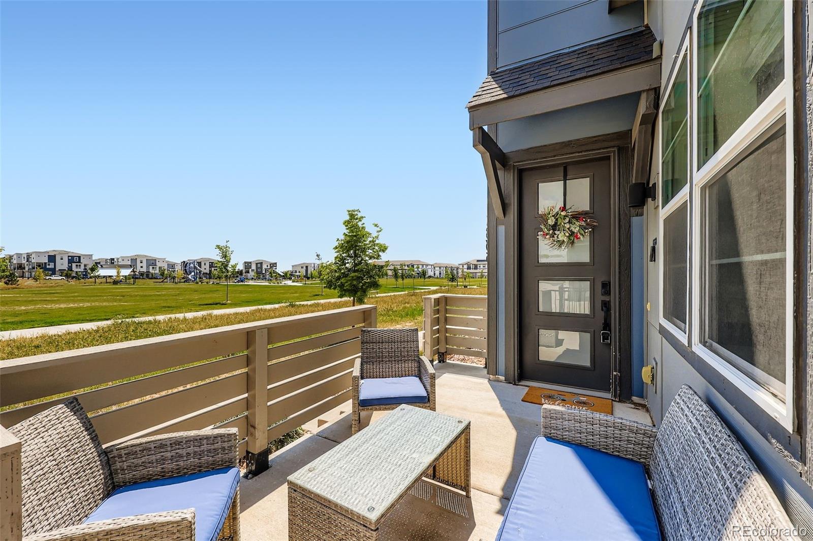 1835 Rose Quartz Heights Colorado Springs, CO 80908 - Photo 4 of 31 a view of a living room and floor to ceiling window