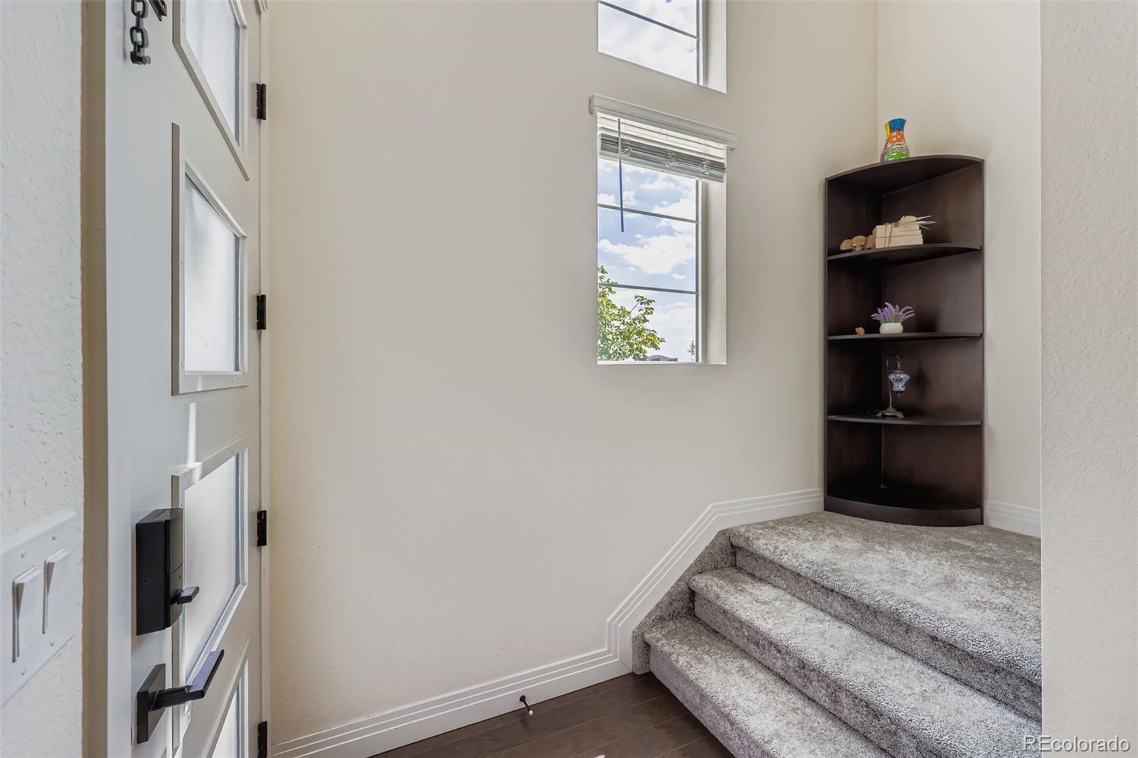 1835 Rose Quartz Heights Colorado Springs, CO 80908 - Photo 5 of 31 a bedroom with a bed and a window