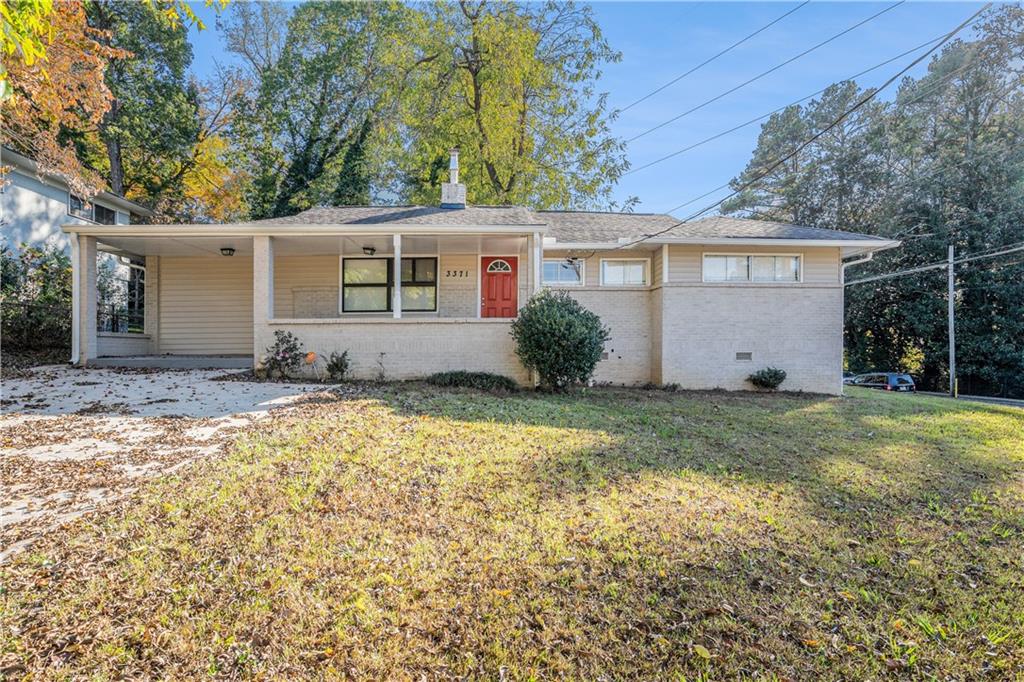 front view of a house with a yard