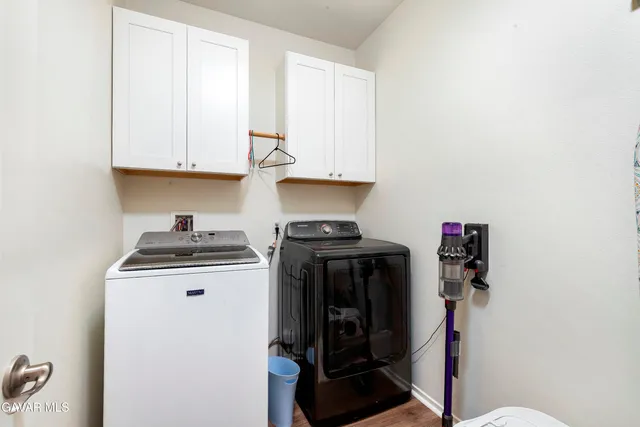 a kitchen with stainless steel appliances granite countertop a stove and a refrigerator