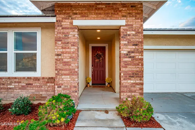 a front view of a house with a porch