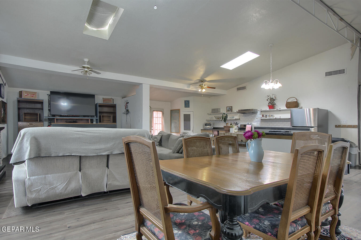 261 Indian Head Road Tornillo, TX 79853 - Photo 19 of 44 a dining room with furniture and wooden floor
