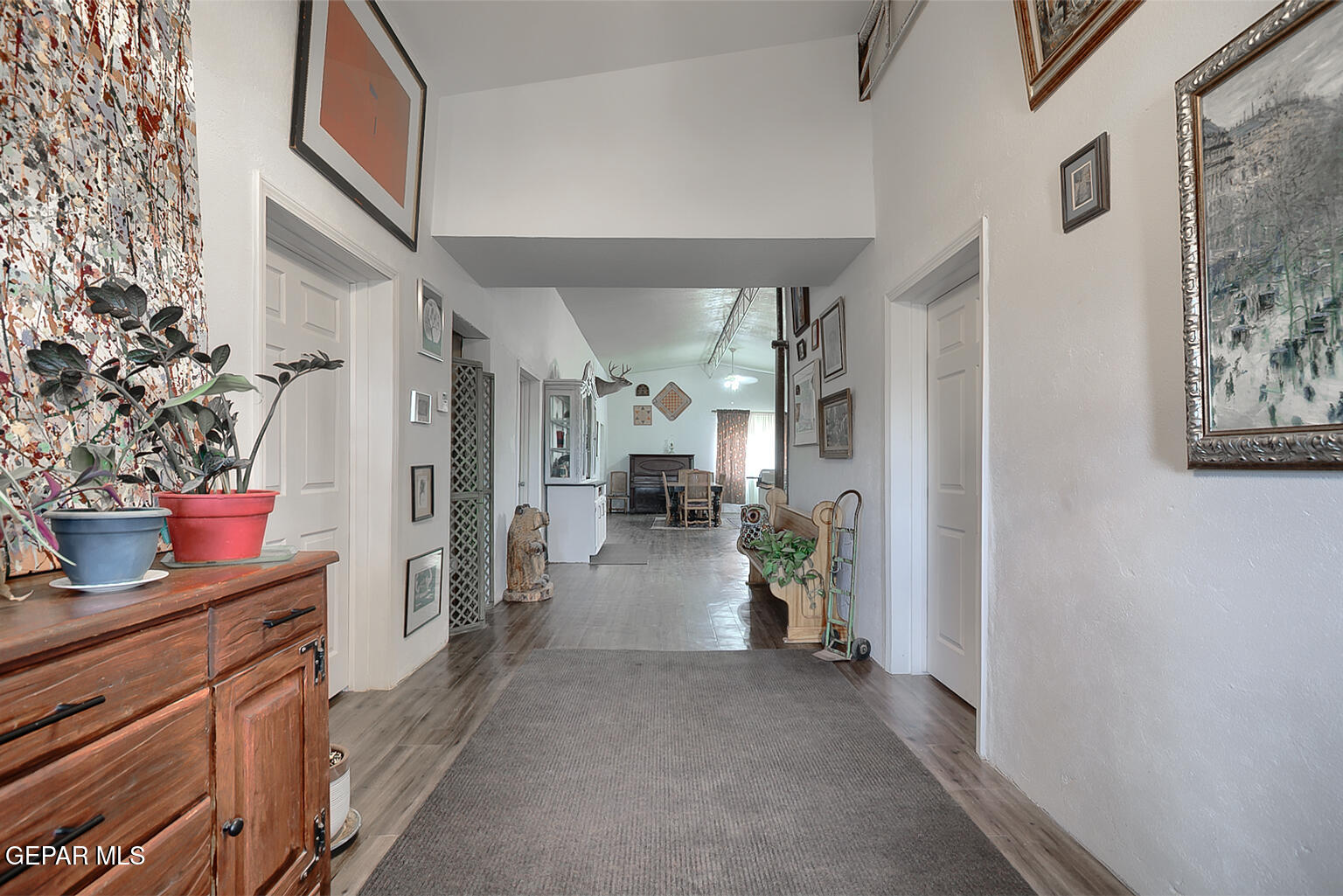 261 Indian Head Road Tornillo, TX 79853 - Photo 6 of 44 a view of a hallway with living room and furniture