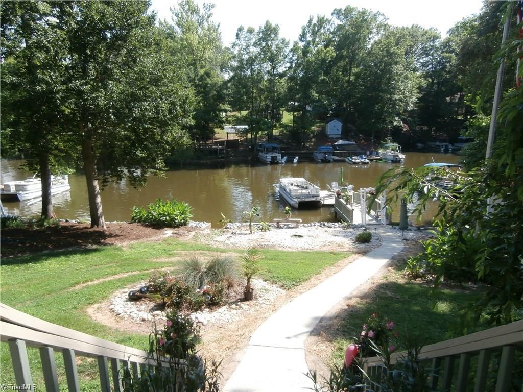 512 Riverview Road Lexington, NC 27292 - Photo 8 of 30 View from your deck, enjoy not only the lake view but the beautiful landscaping.