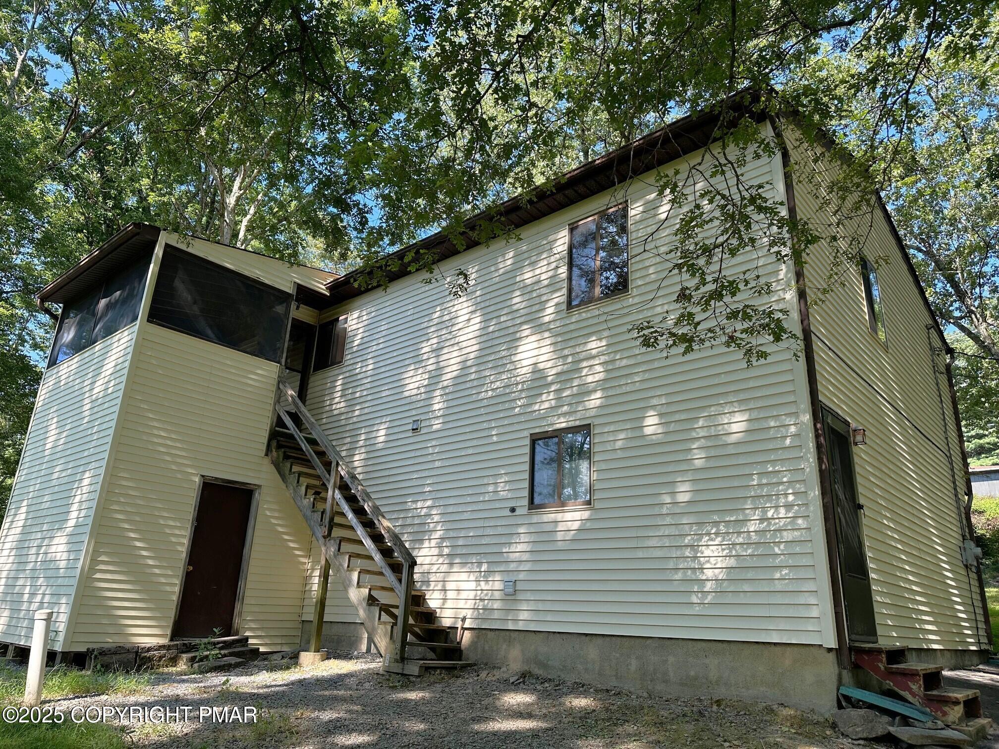 344 Pocono Boulevard, Unit 344 Bushkill, PA 18324 - Photo 20 of 20 a view of a house with a tree