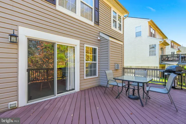 a aerial view of a house with a yard