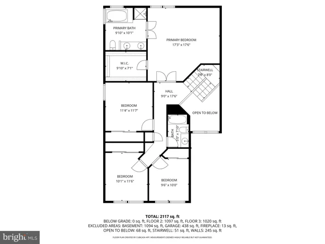 a front view of houses with yard