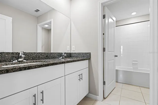 a front view of building with a yard